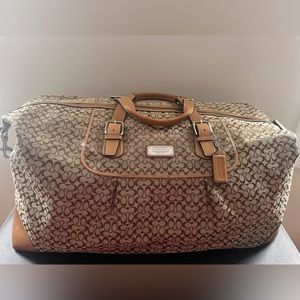 Brand new Coach Duffle bag with shoulder strap.